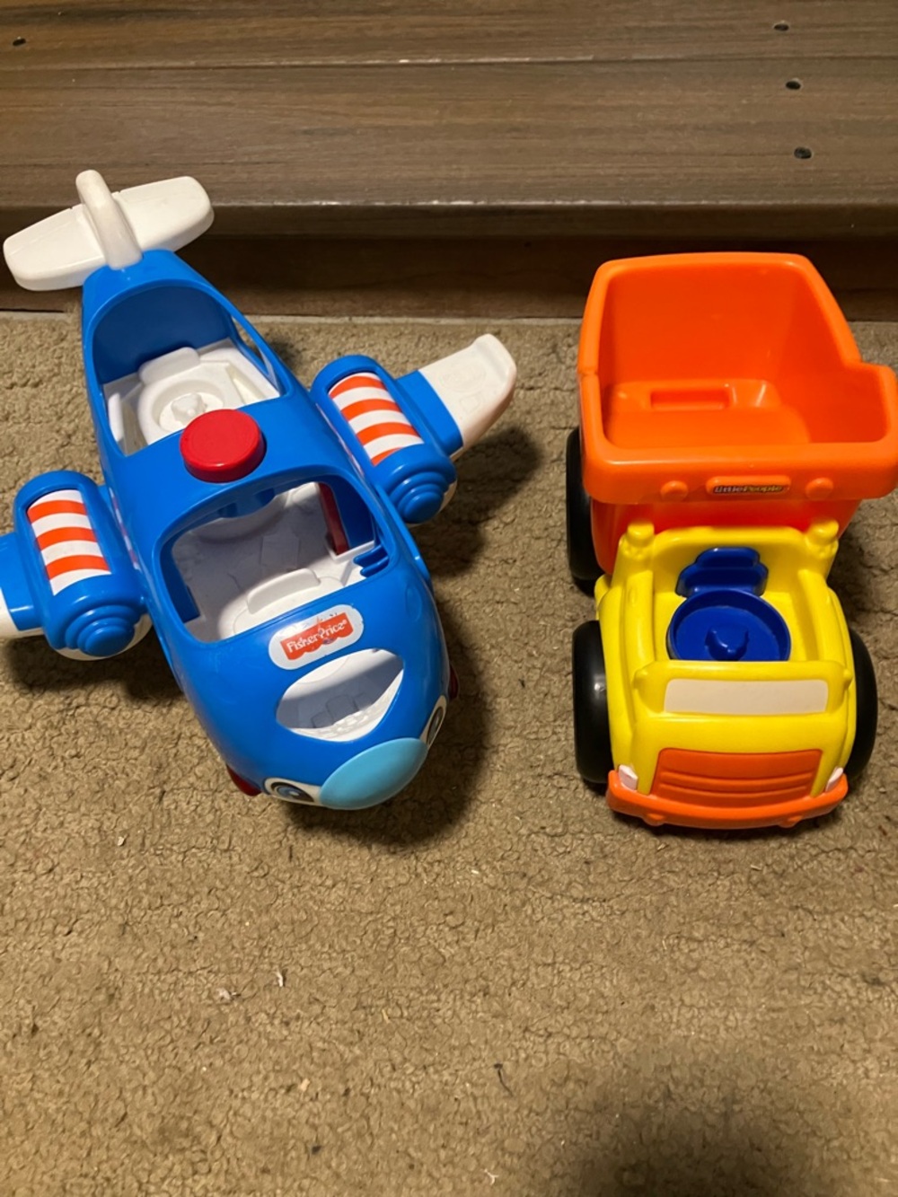 Fisher-Price, musical airplane and musical dump truck